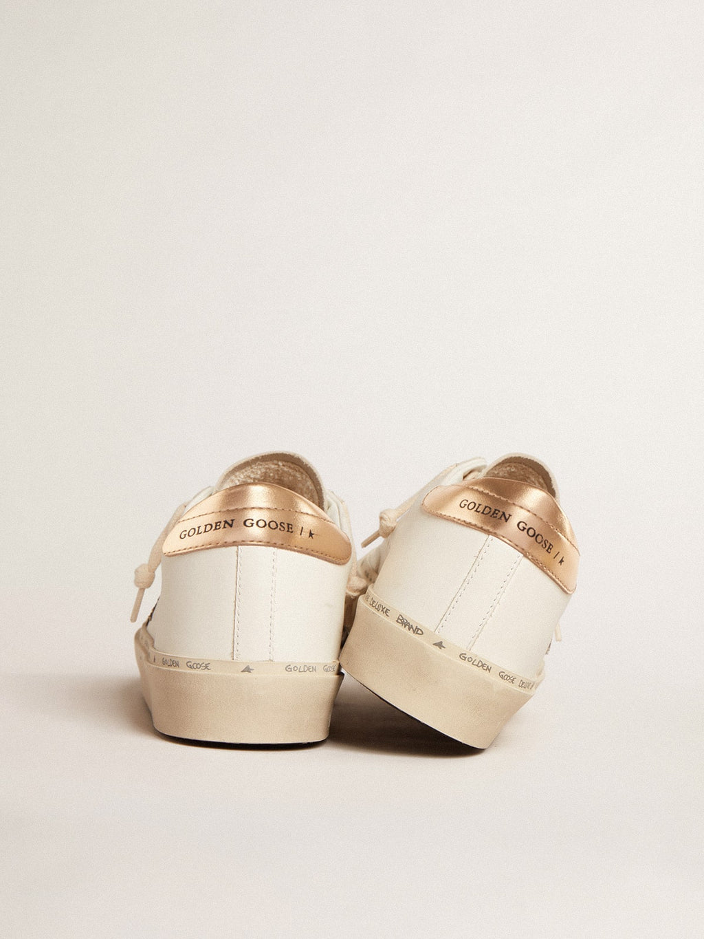 Golden Goose Hi Star s černou a zlatou třpytivou hvězdou a zlatou patní záložkou